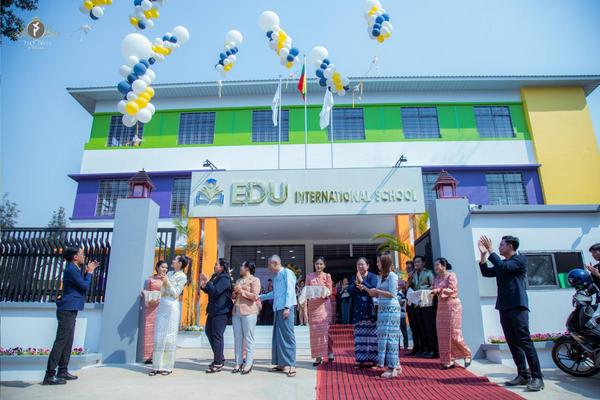 Guests, staff and families at the school opening ceremony, photo 2