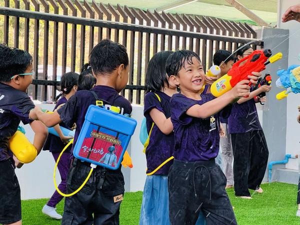 Students celebrating the Myanmar Water Festival, photo 1